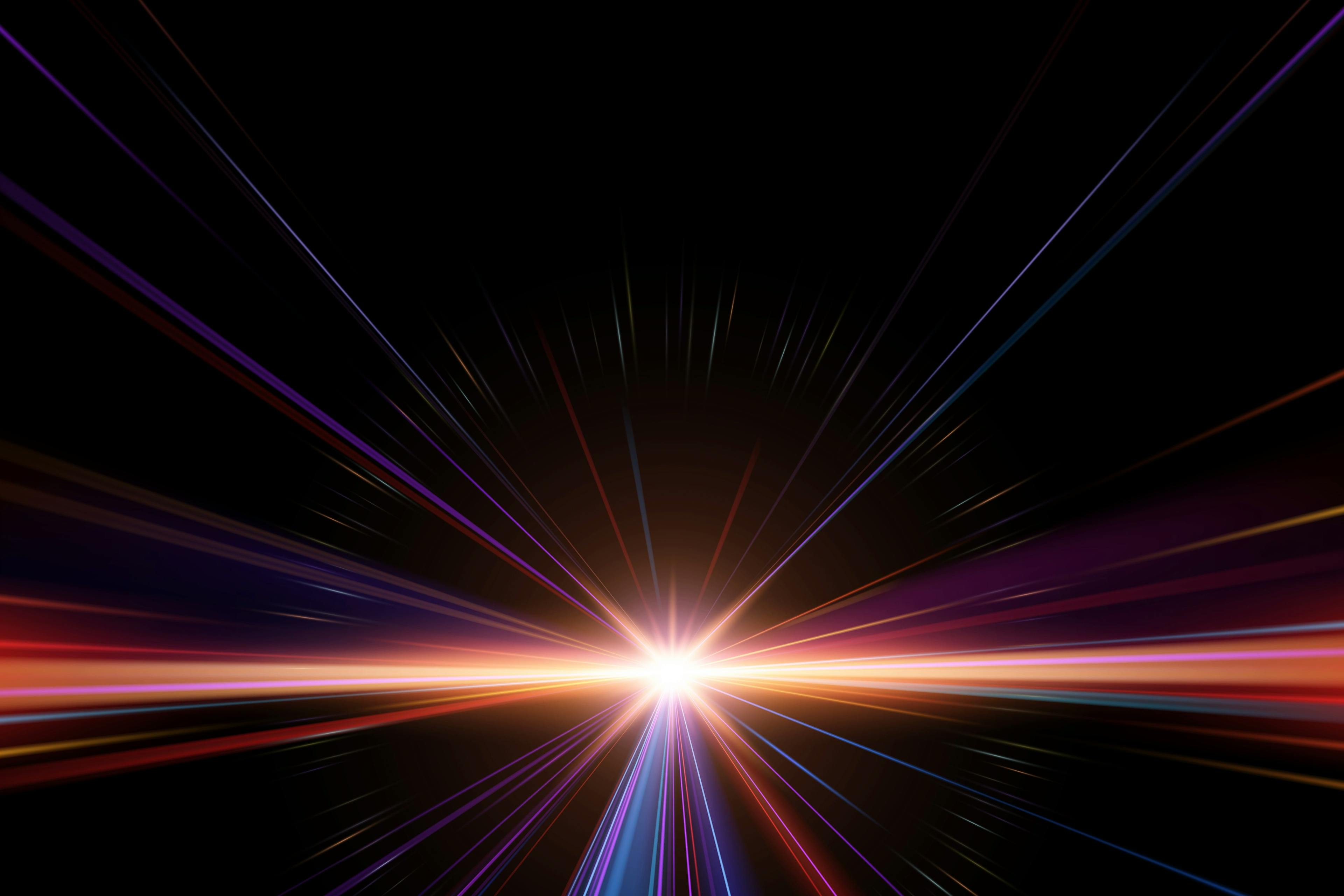 Laser light beams on a dark background with a spotlight in the center